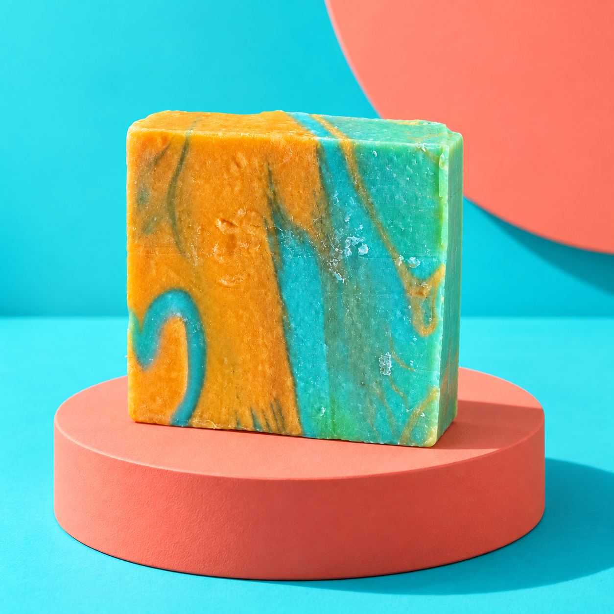 Northern Lights goat's-milk soap bar, marigold and teal swirl