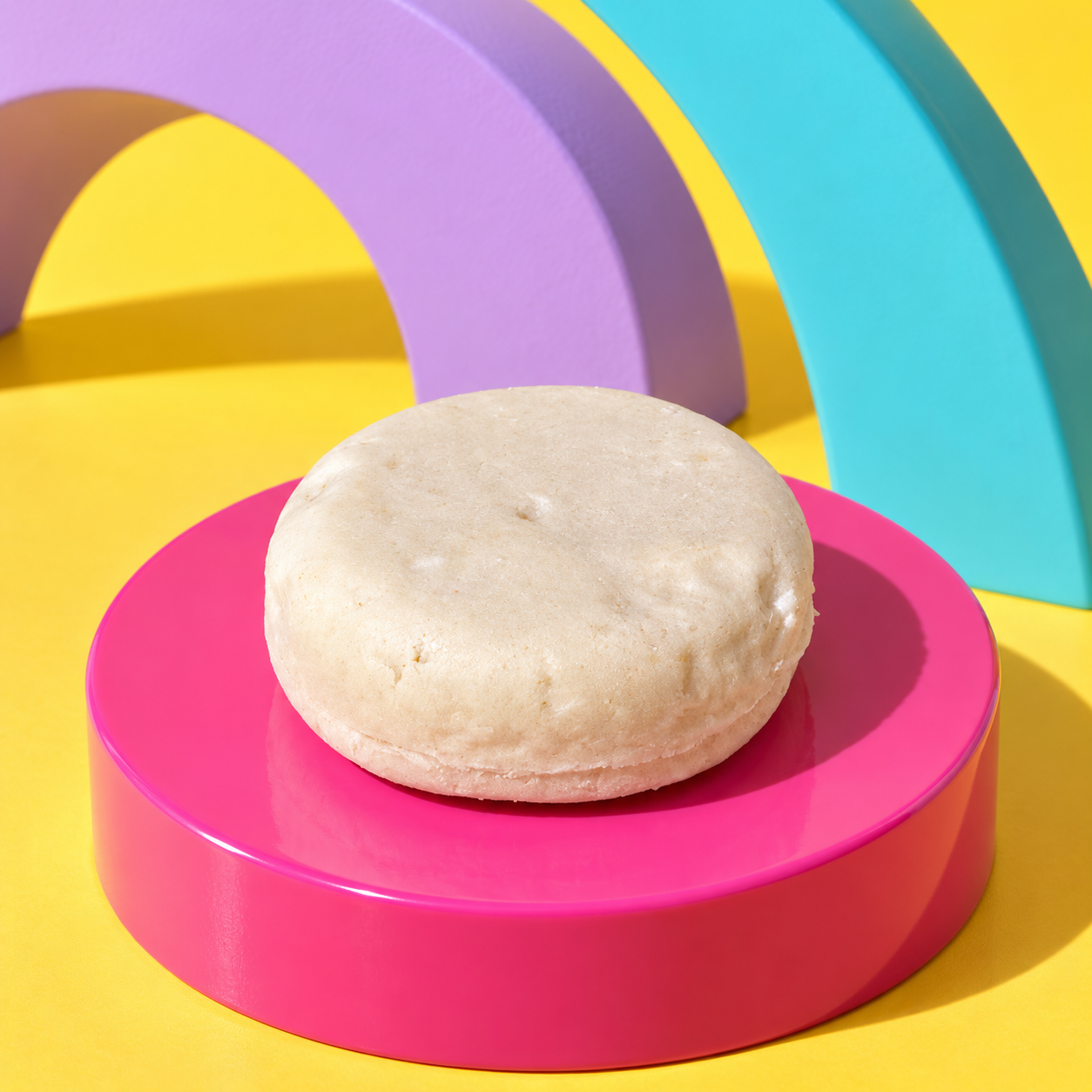 Unicorn Party shampoo bar on a pink pedestal